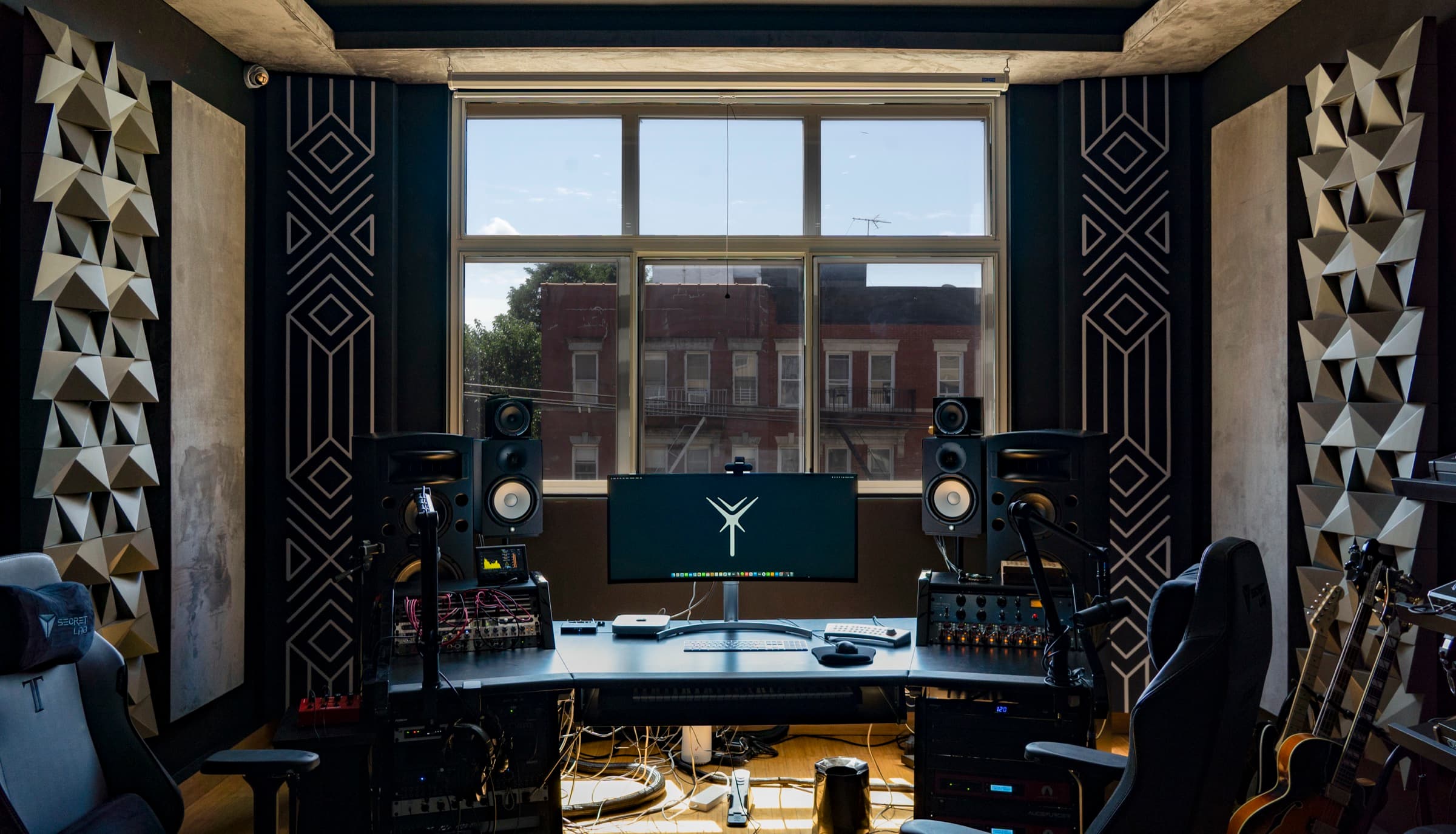 Main control room at Antenna Studios with Augspurger monitors and ultrawide display