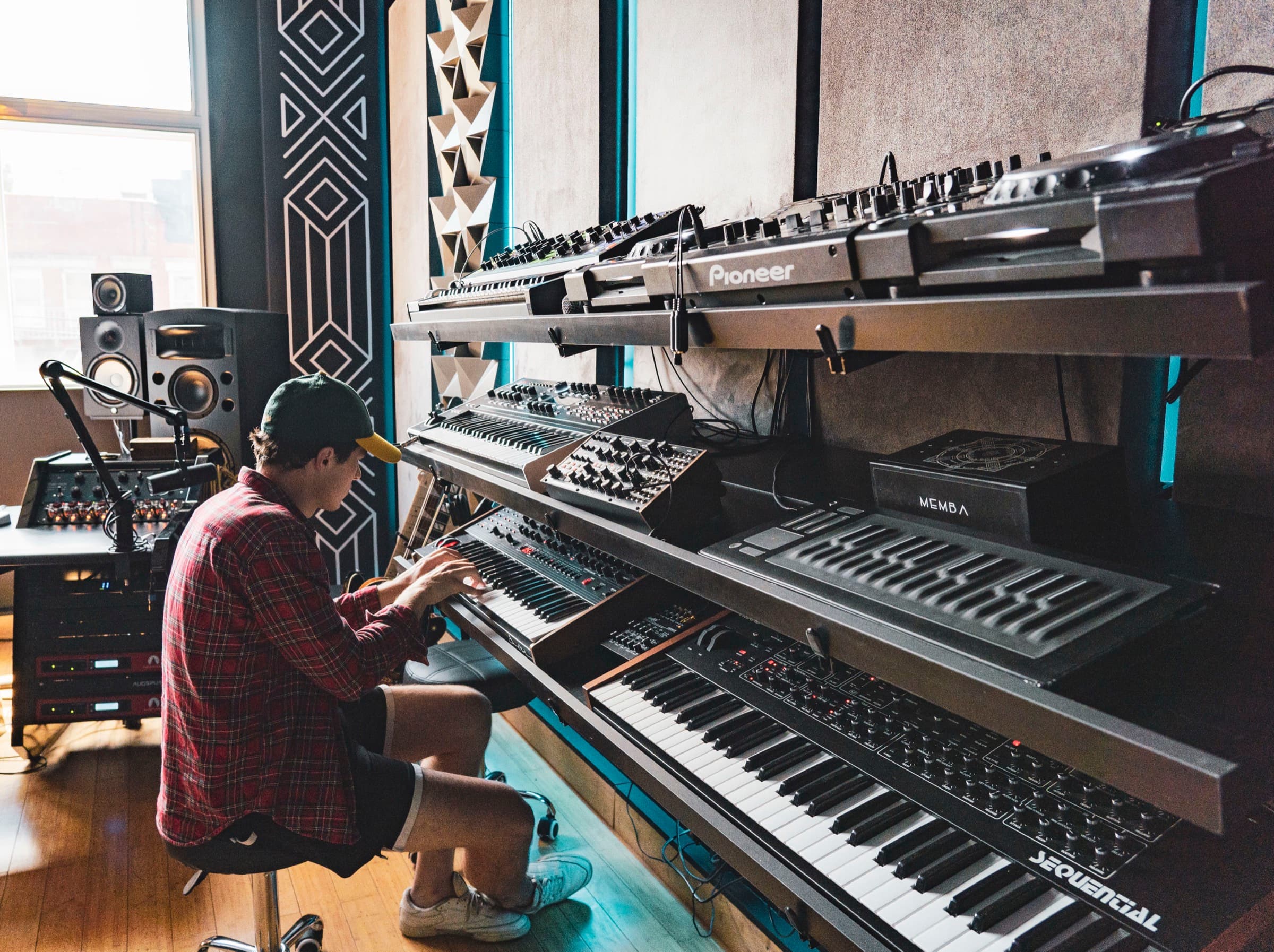 Analog synthesizer rack at Antenna Studios including OB-6, Prophet, and Moog